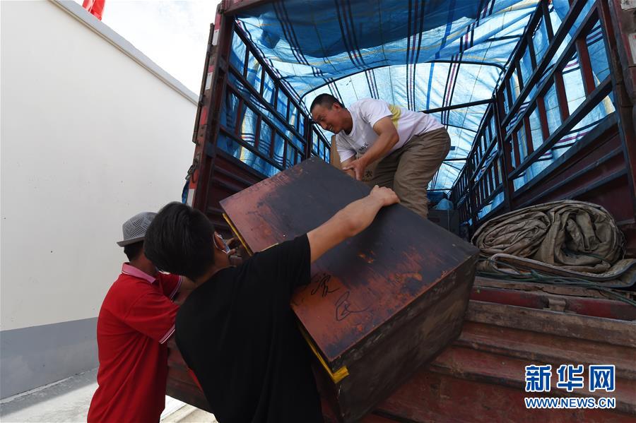 （新華全媒+）（26）千里“挪窩”，踏實開啟新生活