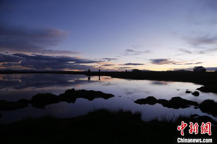 圖為夕陽(yáng)下的查旦濕地?！●R銘言 攝